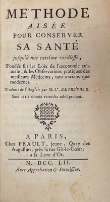 an old book that is open on a table