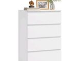 la commode est blanche et il y a une plante dessus