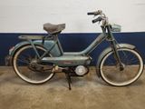 a blue bike that is parked in a garage