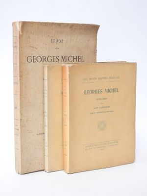 two books sitting on top of each other on a white surface