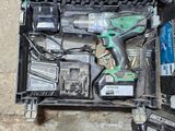 an overhead view of a tool box with tools in it