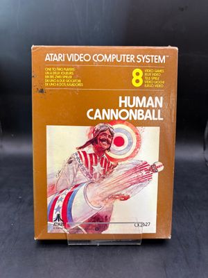 une boîte sur laquelle figure l'image d'un « homme-canon »