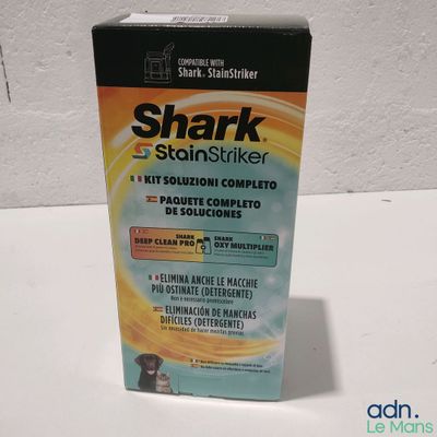 une boîte de « Shark Stainer » posée sur une table