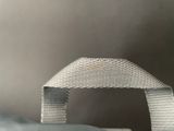 a close up of a bag with a strap on it