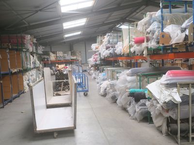 a large warehouse filled with lots of different types of items