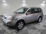 a picture of a silver suv parked in a garage