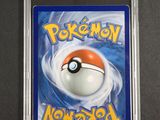 a close up of a card with a pokemon ball on it