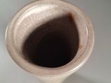 a small vase that is sitting on a table