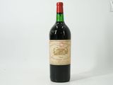 a bottle of wine that is sitting on a table