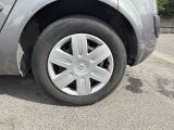 a close up of a car ' s tire on a parking lot