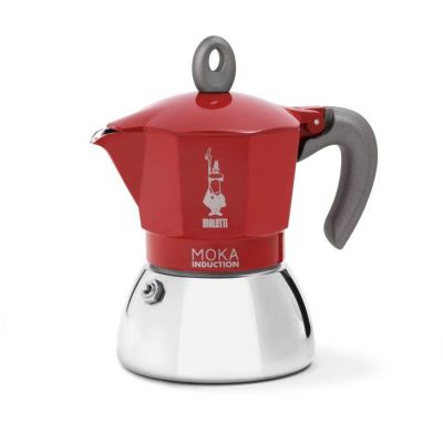 a red moka coffee maker on a white background