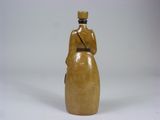 a picture of a bottle with a woman in a dress