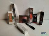a lot of different types of cosmetics on the table