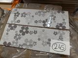 two pieces of paper that have been wrapped up on a table