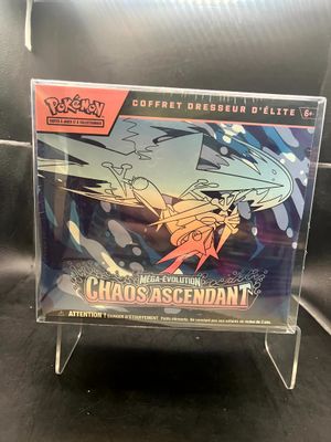 a close up of a box of pokemon trading cards on a table