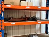a shelf with a lot of boxes on it in a warehouse