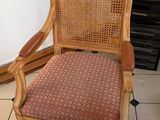 a chair that is sitting in the corner of a room