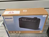 emballage d'un système d'enceintes portables Philips présenté en magasin