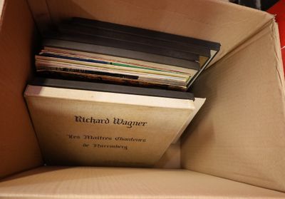 a box with a bunch of books inside of it