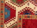 an image of a red and blue rug with a design on it