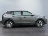 the new nissan kicks up its suv in a parking lot