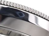 a close up of a watch face with a white background