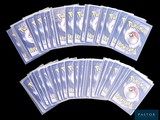 a lot of pokemon cards on a black background