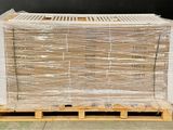une palette sur laquelle se trouvent plusieurs cartons