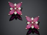 une paire de boucles d'oreilles en rubis et diamants