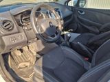dashboard of a car with black seats and steering wheel and dashboard controls