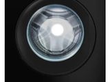 une machine à laver noire sur fond blanc