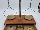 a wooden box with a scale on top of it