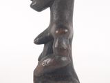 an image of a statue of a woman holding a baby