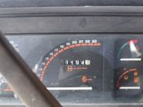 a close up of a car dashboard with a speedometer