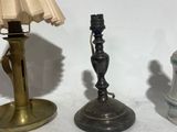 two lamps that are sitting next to each other on a table