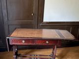 an old wooden table with a drawer on top of it