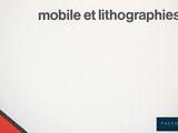 a sign that says mobile ettinggraphies on the side of a building