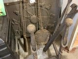 a lot of old tools that are sitting on the floor