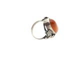 an image of a ring with a carnel stone in it