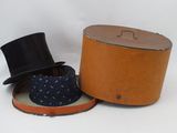 two hats that are sitting next to each other