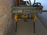 a picture of a table saw in a garage