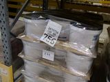 a large stack of boxes on a pallet in a warehouse
