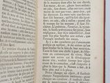an open book with a picture of a bird on it