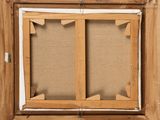 a close up of a wooden frame with a picture in it