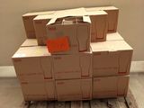 a stack of boxes sitting on a pallet on the floor