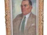 painting of a man in a suit and tie in a gold frame