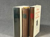 trois livres empilés les uns sur les autres