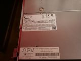 a close up of a metal box with a sticker on it
