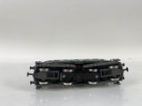 a toy train that is sitting on a white surface
