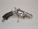 an old gun that is sitting on top of a table